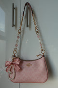 Pink Teri with heart handle extenders + bow charm