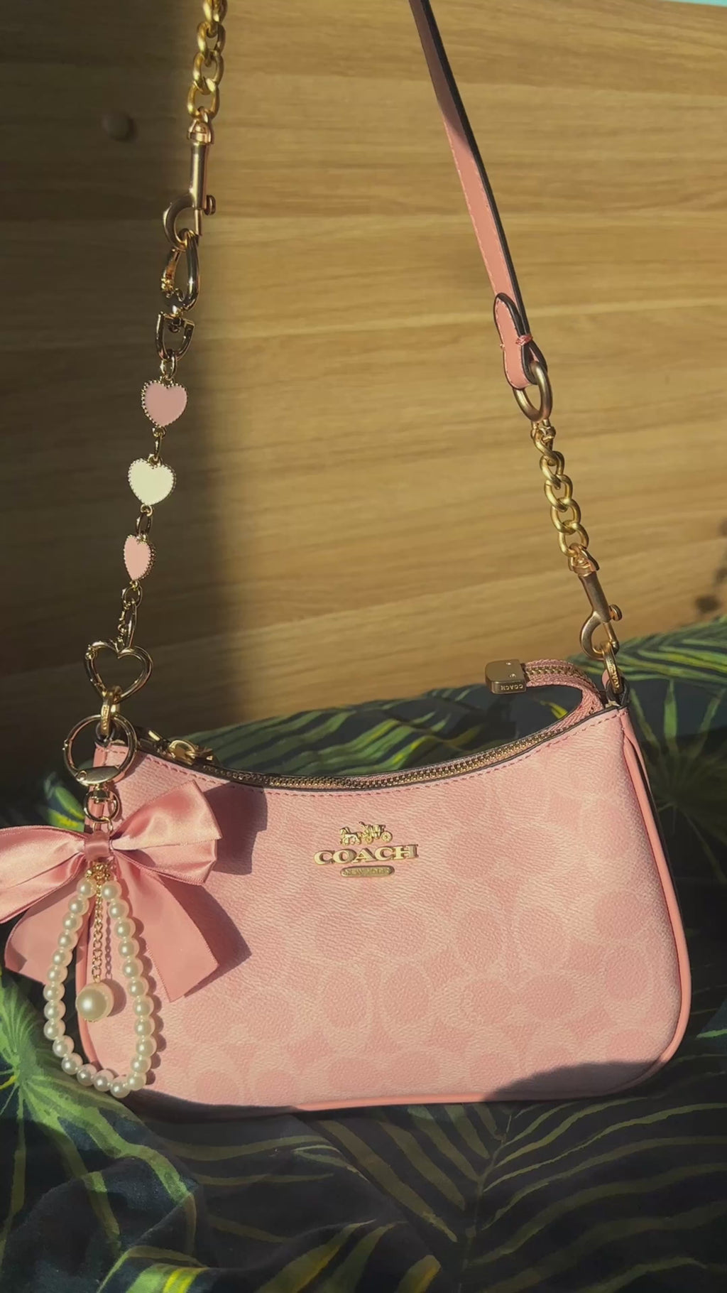 Pink Teri with heart handle extenders + bow charm